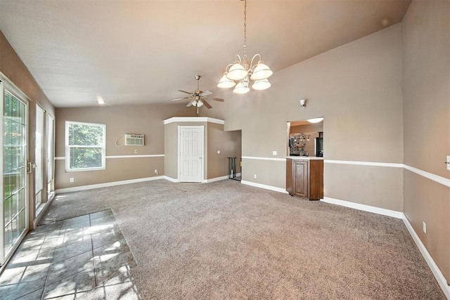 14500 Billy Dr, Edmond, OK 73034 - unfurnished living room featuring lofted ceiling, a chandelier, carpet floors, a ceiling fan, and a wall mounted air conditioner