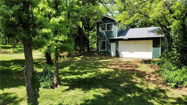 14500 Billy Dr, Edmond, OK 73034 - view of green lawn featuring a garage