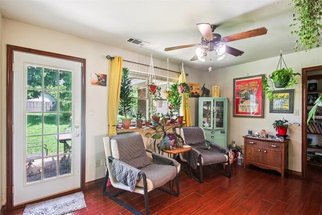 213 Country Club Ter, Oklahoma City, OK 73110 - living area featuring wood finished floors and a ceiling fan