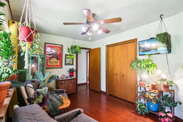 213 Country Club Ter, Oklahoma City, OK 73110 - living room featuring a ceiling fan and wood finished floors