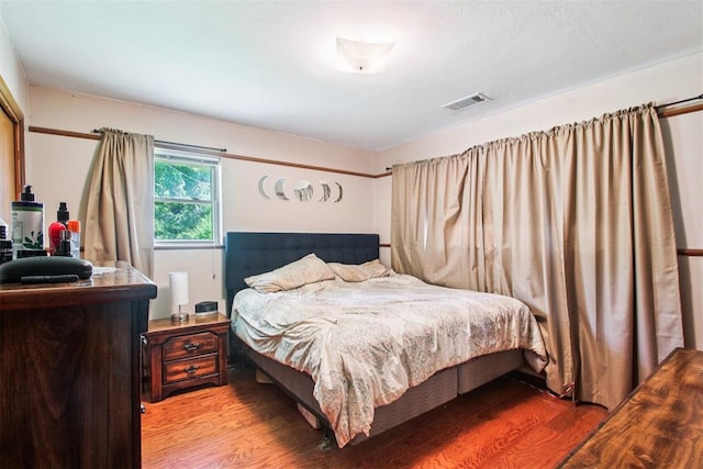 213 Country Club Ter, Oklahoma City, OK 73110 - bedroom featuring wood finished floors