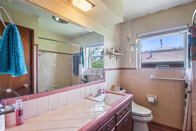 213 Country Club Ter, Oklahoma City, OK 73110 - bathroom featuring wallpapered walls, vanity, a shower with shower curtain, tile walls, and tile patterned flooring