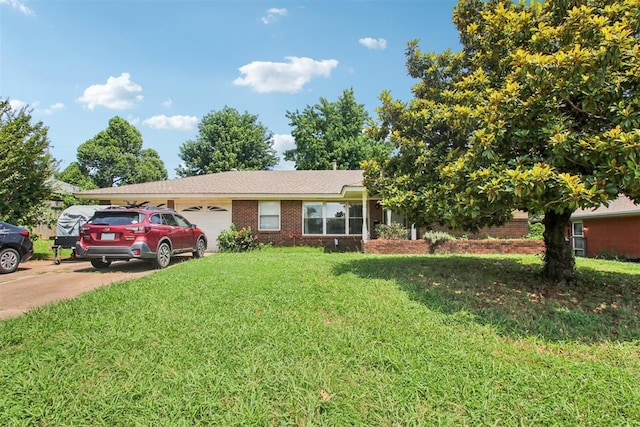 213 Country Club Ter, Oklahoma City, OK 73110 - view of front of property featuring an attached garage, a front lawn, concrete driveway, and brick siding