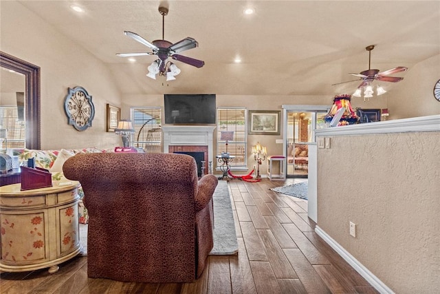 901 Gartrell Pl, Weatherford, OK 73096 - living area with a ceiling fan, plenty of natural light, dark wood finished floors, lofted ceiling, and recessed lighting