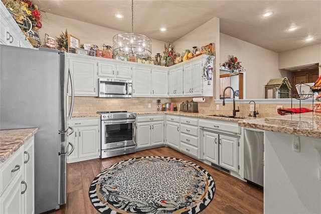 901 Gartrell Pl, Weatherford, OK 73096 - kitchen featuring stainless steel appliances, backsplash, white cabinets, and recessed lighting