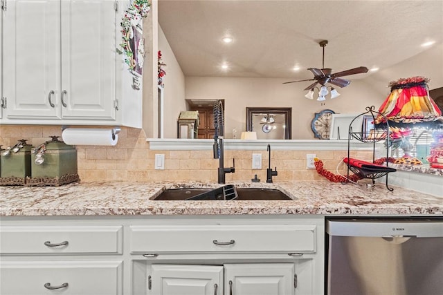 901 Gartrell Pl, Weatherford, OK 73096 - kitchen featuring dishwasher, a ceiling fan, decorative backsplash, white cabinetry, and recessed lighting