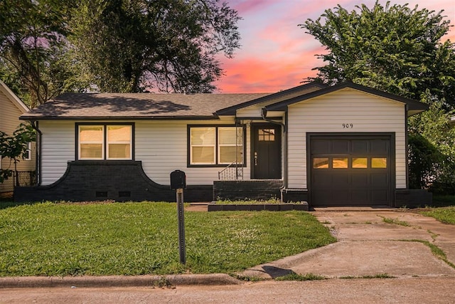 909 Buck Dr, Shawnee, OK 74801 - ranch-style house with an attached garage, a lawn, concrete driveway, crawl space, and roof with shingles