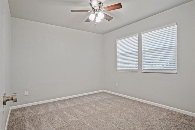909 Buck Dr, Shawnee, OK 74801 - carpeted spare room with ceiling fan and baseboards
