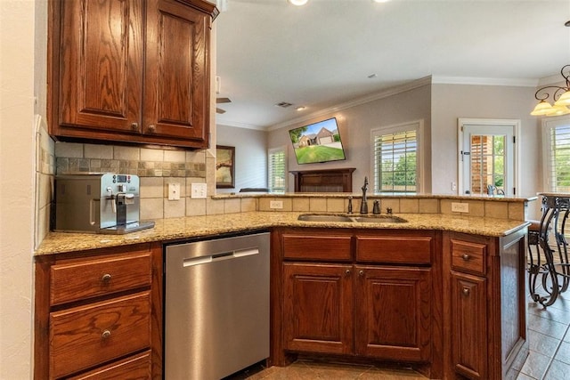 1106 Prairie Dunes Ct, Norman, OK 73072 - kitchen featuring dishwasher, plenty of natural light, light stone counters, backsplash, and ornamental molding