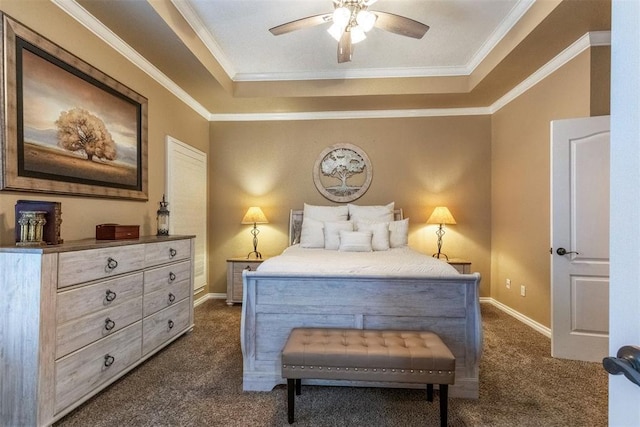 1106 Prairie Dunes Ct, Norman, OK 73072 - bedroom with dark carpet, a tray ceiling, crown molding, and a ceiling fan