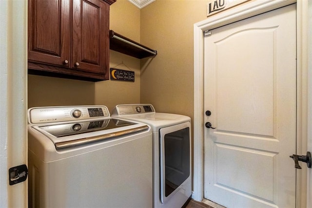 1106 Prairie Dunes Ct, Norman, OK 73072 - laundry area with cabinet space and independent washer and dryer