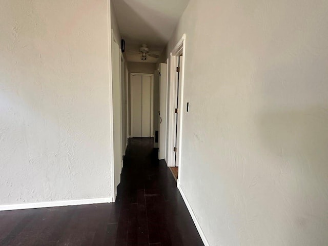 115 S Main St, Sharon, OK 73857 - corridor with baseboards and wood finished floors