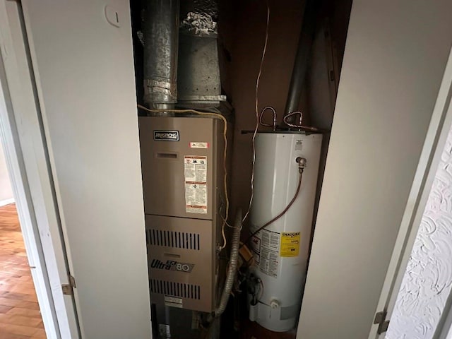 115 S Main St, Sharon, OK 73857 - utility room with gas water heater