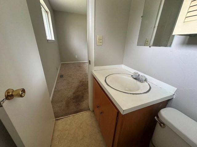 115 S Main St, Sharon, OK 73857 - half bath featuring vanity and toilet