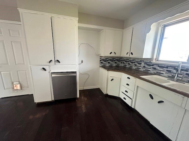 115 S Main St, Sharon, OK 73857 - kitchen with tasteful backsplash, dark wood-style floors, and white cabinets