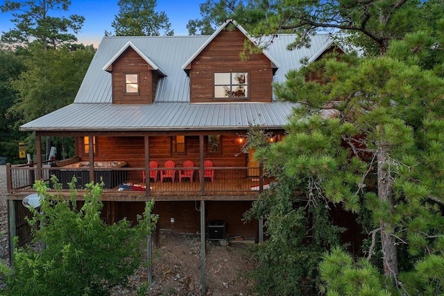 708 Split Creek Ln, Broken Bow, OK 74728 - back of property with a metal roof