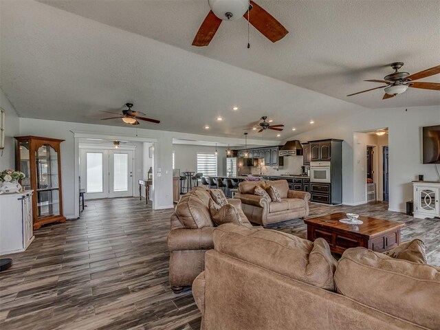 111 E Memorial, Marlow, OK 73055 - living area with ceiling fan, vaulted ceiling, a textured ceiling, dark wood finished floors, and recessed lighting