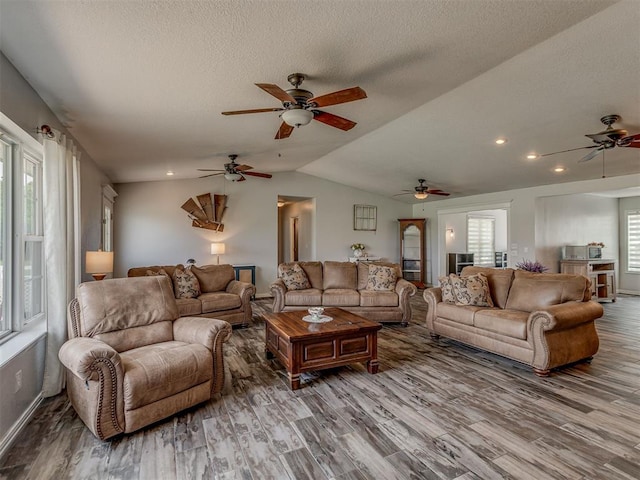 111 E Memorial, Marlow, OK 73055 - living room with ceiling fan, wood finished floors, vaulted ceiling, a textured ceiling, and recessed lighting