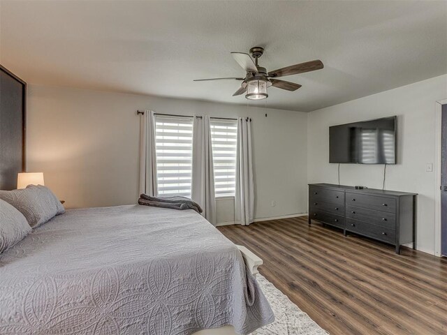 111 E Memorial, Marlow, OK 73055 - bedroom featuring wood finished floors and ceiling fan