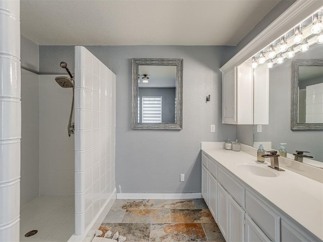 111 E Memorial, Marlow, OK 73055 - full bath featuring tiled shower, vanity, and stone finish floors