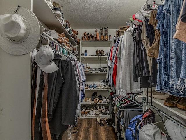 111 E Memorial, Marlow, OK 73055 - walk in closet featuring wood finished floors