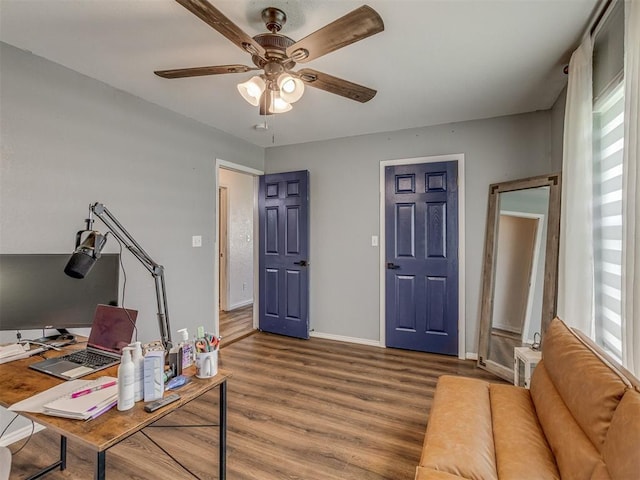 111 E Memorial, Marlow, OK 73055 - office space with a ceiling fan and wood finished floors