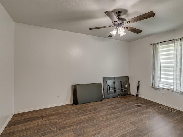 111 E Memorial, Marlow, OK 73055 - unfurnished room with wood finished floors and ceiling fan
