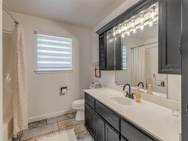 111 E Memorial, Marlow, OK 73055 - bathroom with vanity and shower / bath combo with shower curtain