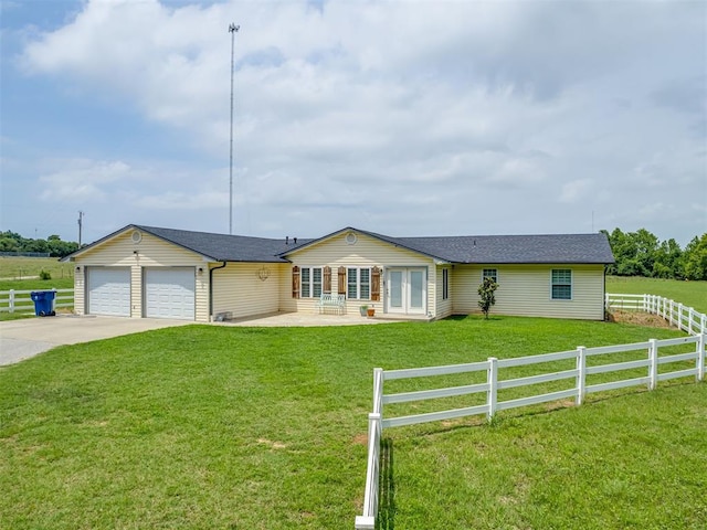 111 E Memorial, Marlow, OK 73055 - ranch-style house with driveway, french doors, roof with shingles, a garage, and a patio