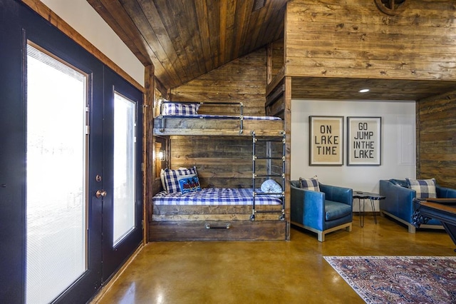 99 Sawtooth Pine Rd, Broken Bow, OK 74728 - living room with vaulted ceiling, wooden walls, wood ceiling, and concrete floors