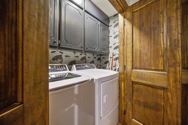 99 Sawtooth Pine Rd, Broken Bow, OK 74728 - laundry room featuring cabinet space, washer and dryer, and wallpapered walls