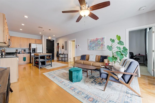444 N Central Ave Unit 106, Oklahoma City, OK 73104 - living room with ceiling fan, recessed lighting, and light wood finished floors