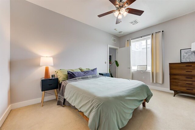 444 N Central Ave Unit 106, Oklahoma City, OK 73104 - bedroom featuring light colored carpet and a ceiling fan