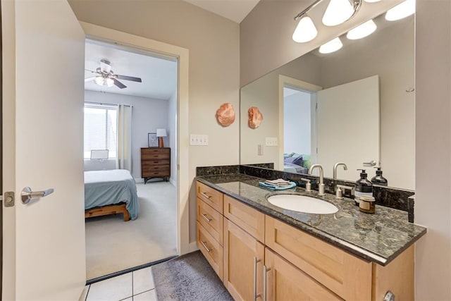 444 N Central Ave Unit 106, Oklahoma City, OK 73104 - bathroom featuring connected bathroom, vanity, tile patterned flooring, and ceiling fan