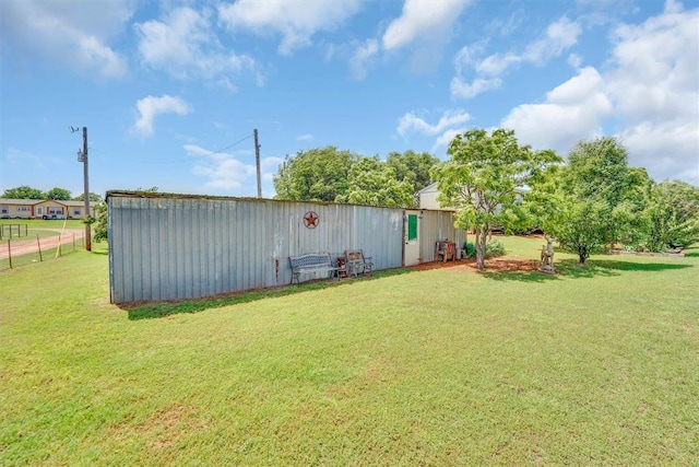 11221 N 1928th Rd, Sayre, OK 73662 - view of green lawn featuring a pole building and an outbuilding