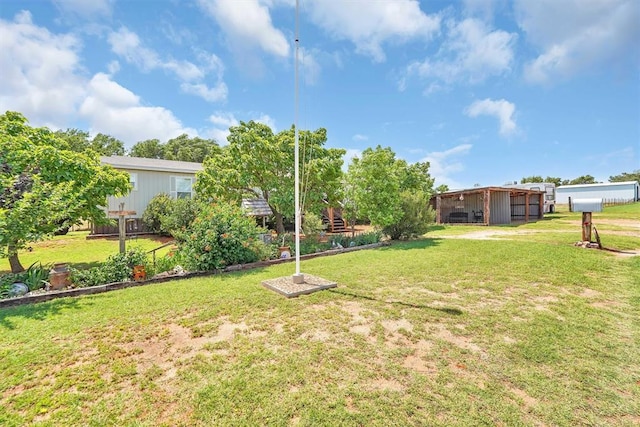 11221 N 1928th Rd, Sayre, OK 73662 - view of grassy yard featuring a pole building and an outbuilding