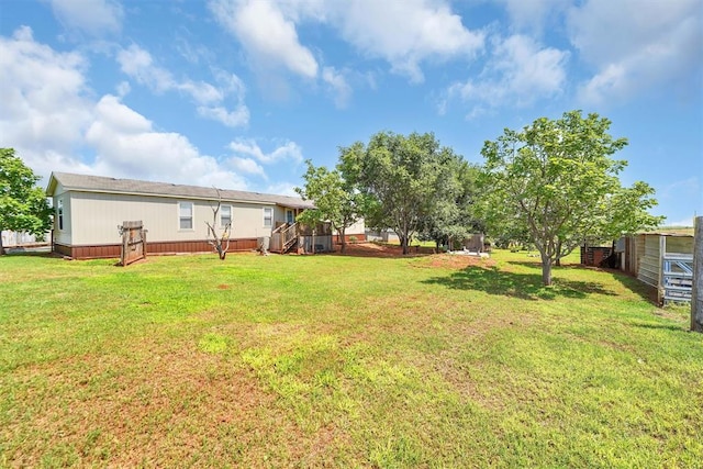 11221 N 1928th Rd, Sayre, OK 73662 - view of green lawn with a deck
