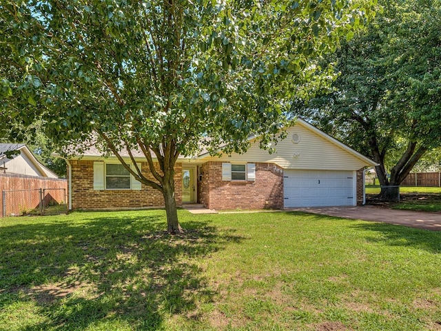209 SW 6th St, Blanchard, OK 73010 - view of front of home featuring driveway, a garage, and brick siding