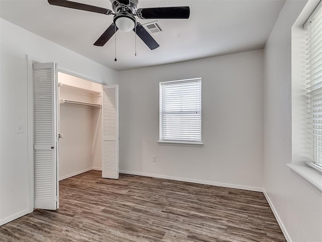209 SW 6th St, Blanchard, OK 73010 - unfurnished bedroom featuring wood finished floors, a closet, and ceiling fan