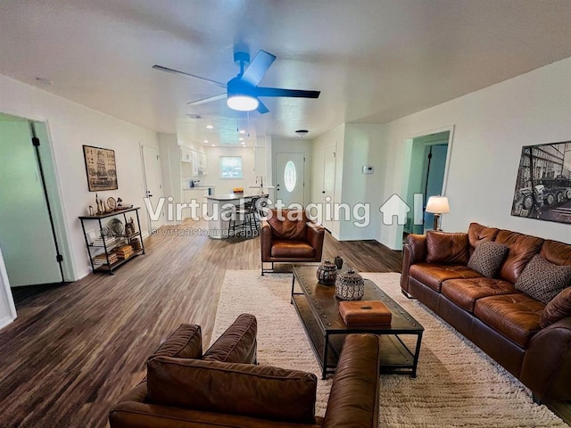 209 SW 6th St, Blanchard, OK 73010 - living area featuring wood finished floors and ceiling fan