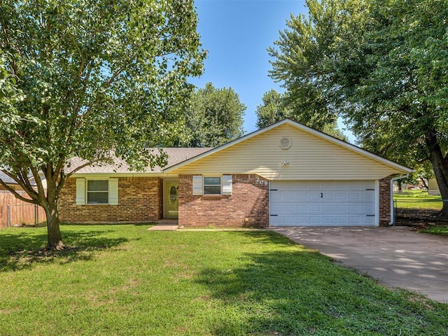 209 SW 6th St, Blanchard, OK 73010 - single story home featuring an attached garage, asphalt driveway, and brick siding