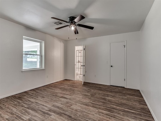 209 SW 6th St, Blanchard, OK 73010 - unfurnished room with dark wood-type flooring and ceiling fan