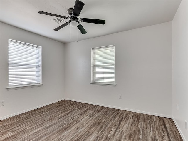 209 SW 6th St, Blanchard, OK 73010 - empty room with wood finished floors and a ceiling fan