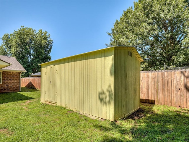 209 SW 6th St, Blanchard, OK 73010 - view of shed featuring a fenced backyard