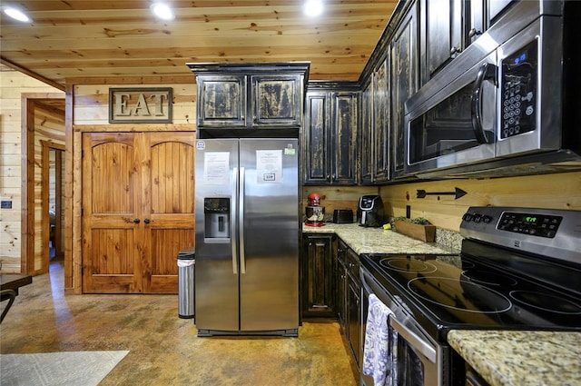 318 Camp Ranch Rd, Broken Bow, OK 74728 - kitchen with stainless steel appliances, concrete flooring, wood ceiling, wood walls, and light stone counters