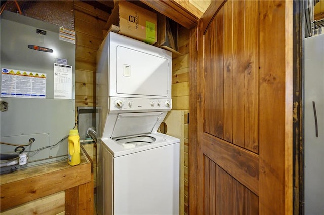 318 Camp Ranch Rd, Broken Bow, OK 74728 - laundry area featuring stacked washer / drying machine and heating unit