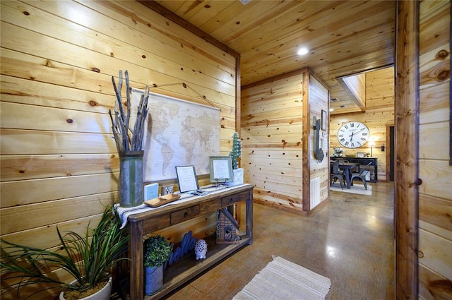 318 Camp Ranch Rd, Broken Bow, OK 74728 - home office with wood ceiling, wood walls, a skylight, concrete floors, and recessed lighting