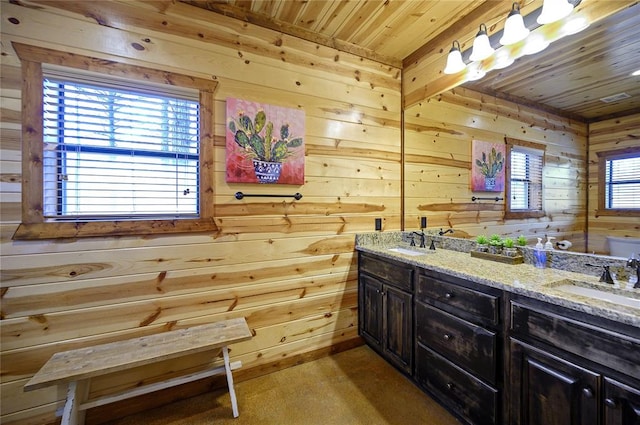 318 Camp Ranch Rd, Broken Bow, OK 74728 - full bathroom with wood ceiling, wooden walls, and double vanity