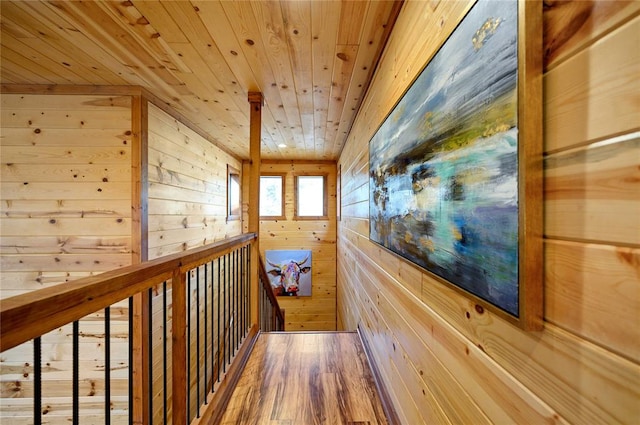 318 Camp Ranch Rd, Broken Bow, OK 74728 - corridor featuring wood walls, wooden ceiling, and wood finished floors