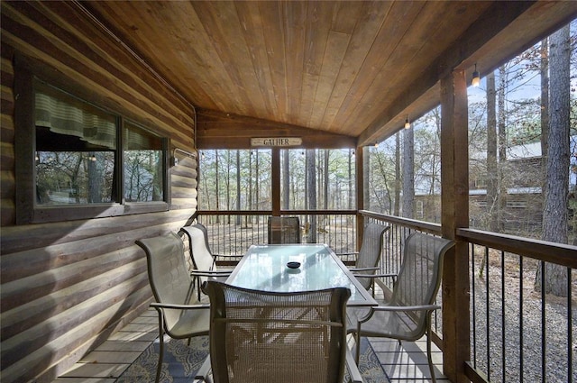 318 Camp Ranch Rd, Broken Bow, OK 74728 - sunroom / solarium with lofted ceiling and outdoor dining space